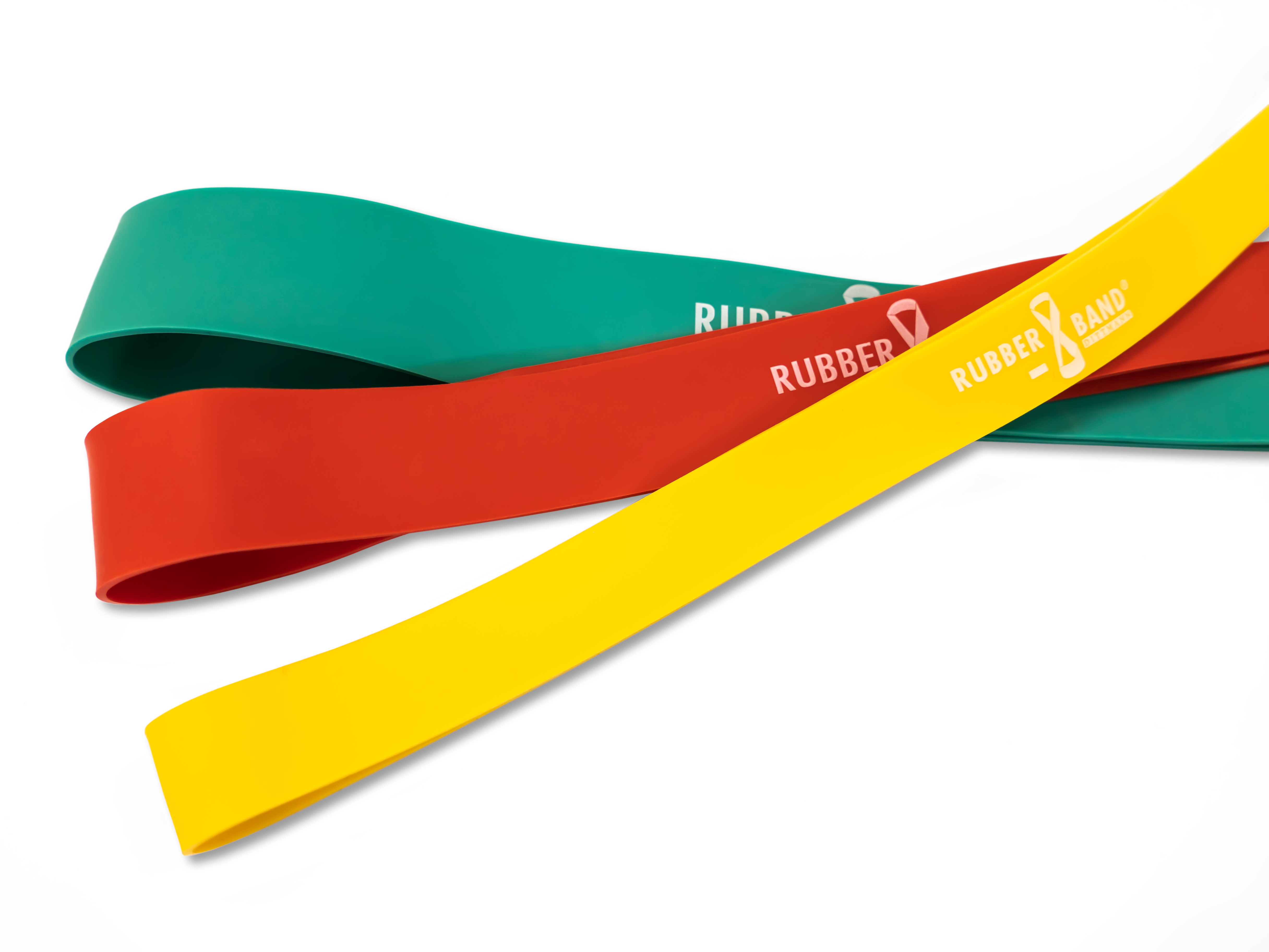 Dittmann Rubberband mit Logo über kreuz liegend alle drei Farben